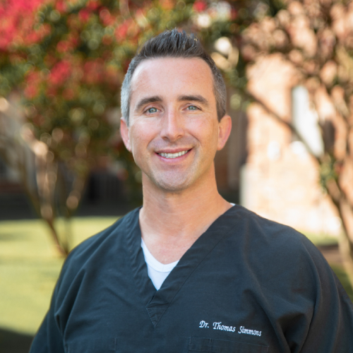 Dr. Thomas Simmons, our Plano dentist, wearing a warm and welcoming smile.