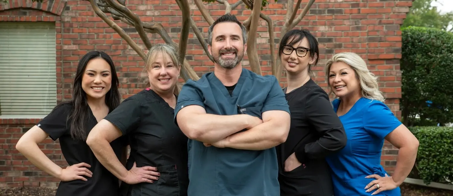 Dr. Simmons and his team outside